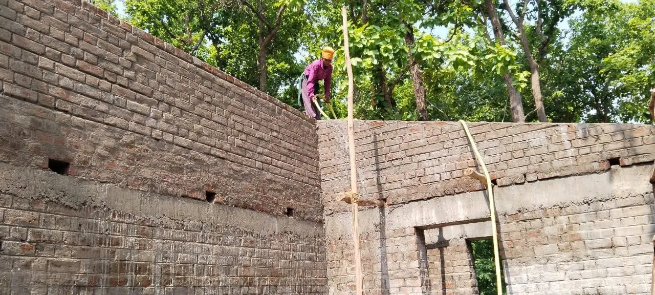 Finishing a wall corner at Forest Rest House